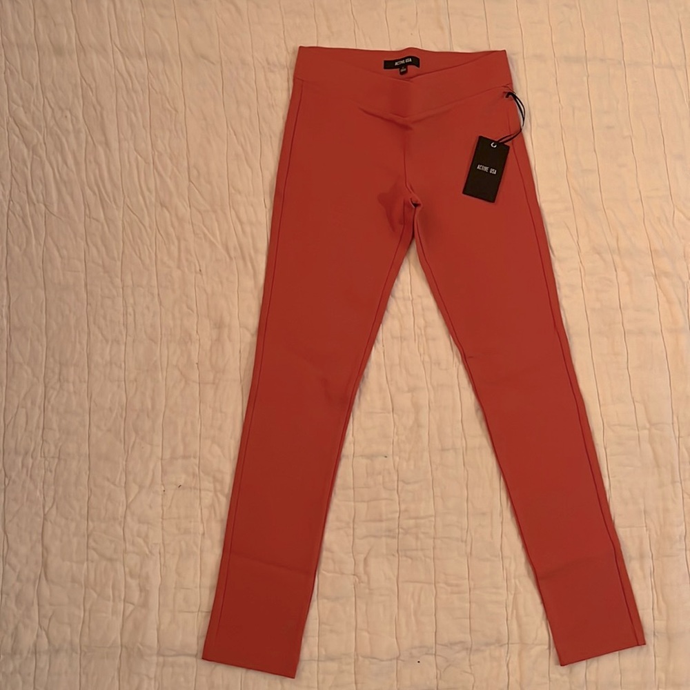 Dark coral skinny pants